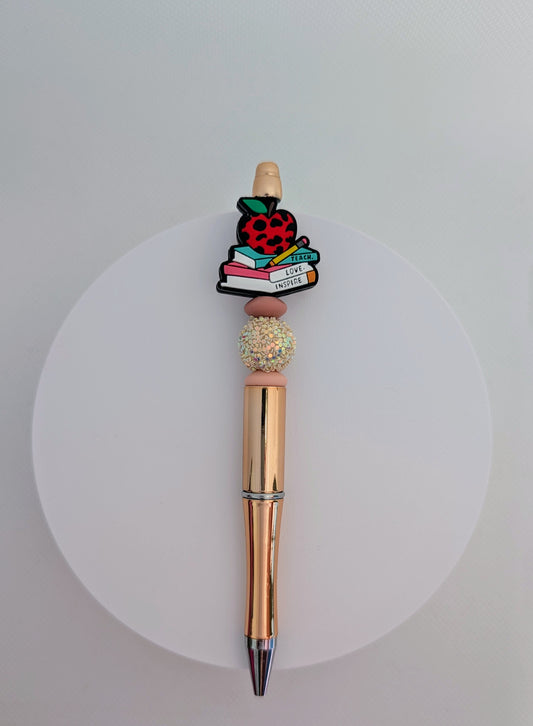 Bolígrafo de maestra